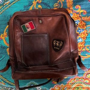 Backpack, main pocket for Laptops up to 15”, inside three other compartments.